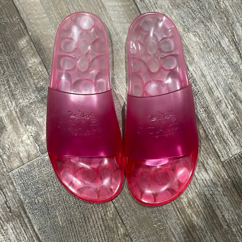 Pink jelly coat slides never been worn in great condition.